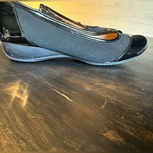 Women’s black wedge flats